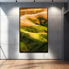 Tall abstract landscape with flowing green hills and golden ochre slopes