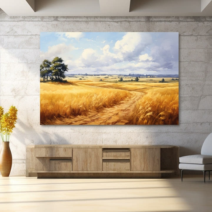 Winding path through a golden wheat field under drifting clouds