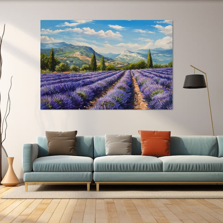 Provence lavender field stretching toward distant mountains and a pale rocky summit