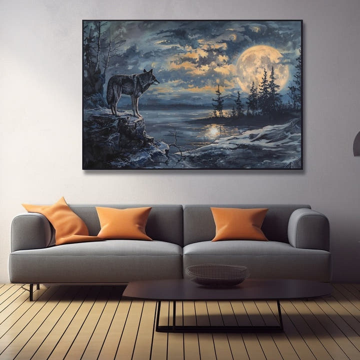 Wolf on a rocky shore gazing across a moonlit lake beneath a full moon