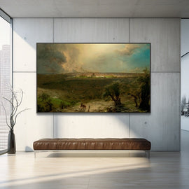 Wide valley landscape with distant town under a luminous storm sky