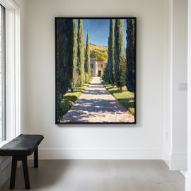 Cypress-lined gravel drive leading to a Tuscan stone farmhouse