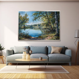 Calm woodland lake with a silver birch tree and reeds in summer