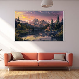 Mountain lake at sunset with snowy peaks, pine forest and pink sky