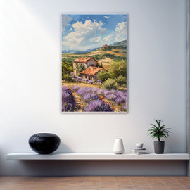 Provence farmhouse among lavender fields under a bright cloudy sky