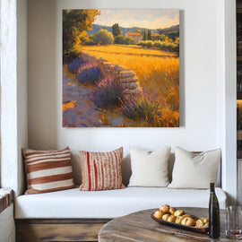Provence landscape with purple lavender, a dry-stone wall and golden wheat fields