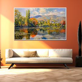 Impressionist riverside village landscape in autumn colours reflected in water