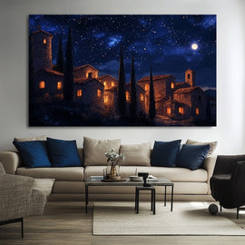 Painting of a starlit hillside village with glowing windows under a full moon