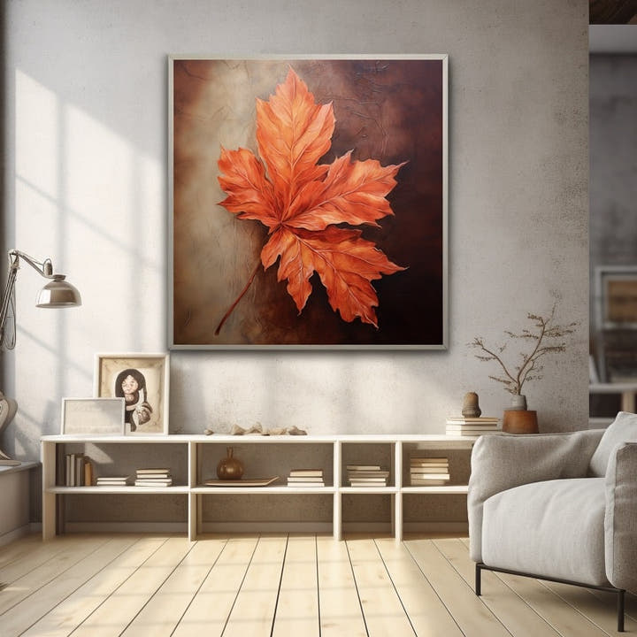 Large painting of a glowing amber maple leaf on a dark brown background