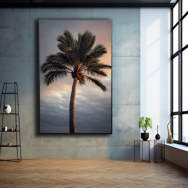 Lone coconut palm against a pink and grey dusk sky