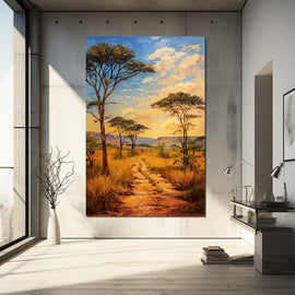 African savannah landscape with acacia trees and dirt track toward distant mountains