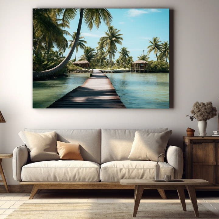 Wooden jetty over a turquoise lagoon to thatched palm huts