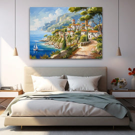 Italian coastal village with whitewashed houses and a sailing boat on a turquoise sea