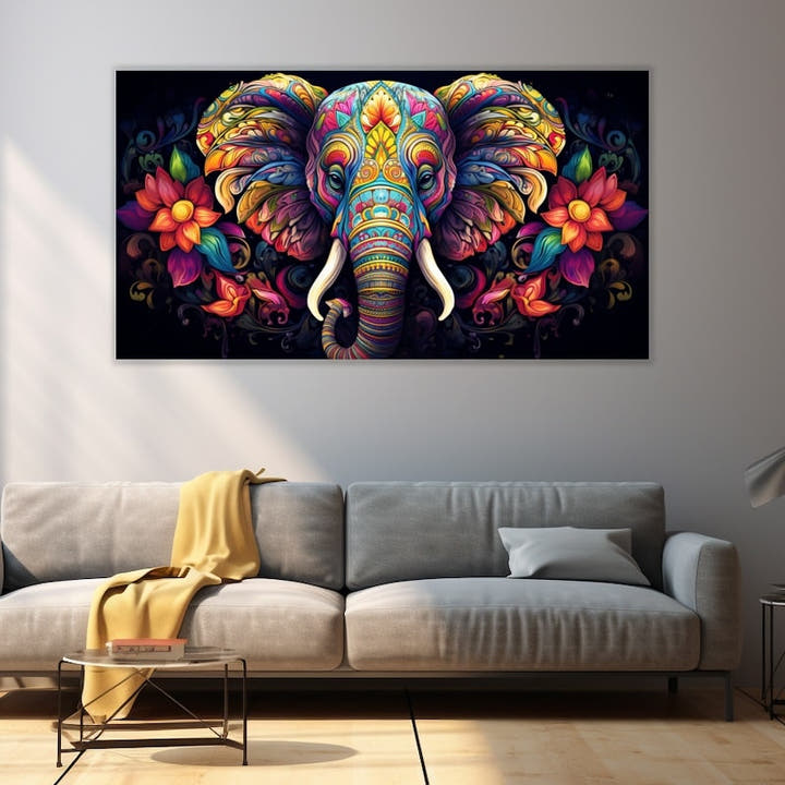Mandala-patterned elephant in fuchsia, gold and turquoise on a black background