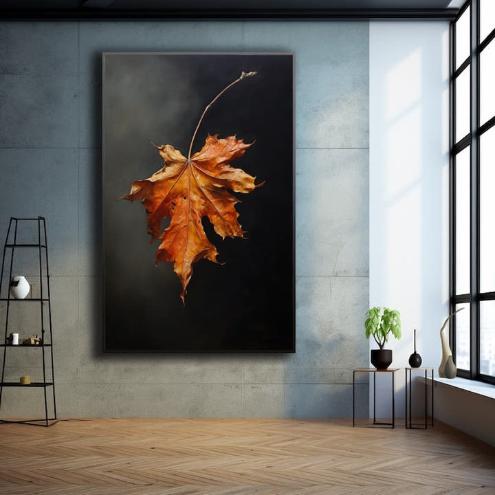 Amber autumn maple leaf glowing against a dark charcoal background