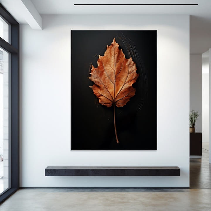 Copper dried leaf standing on a pure black background