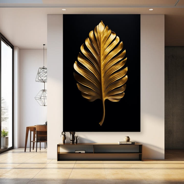 Slender gold feather-shaped leaf with branching lobes on black