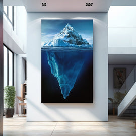 Iceberg with snowy peak and glowing turquoise mass underwater
