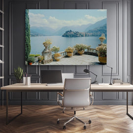 Italian lake terrace with cypress, flower-filled urns and balustrade overlooking a misty lake and villas