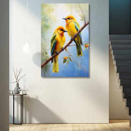 Painting of two golden tropical birds with emerald wings on a branch
