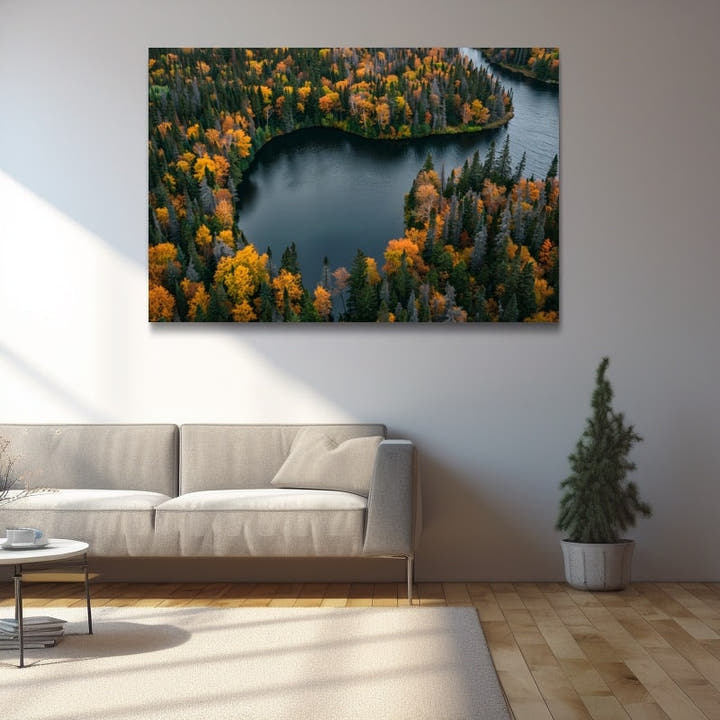 Aerial painting of a winding lake through an autumn forest in amber and orange