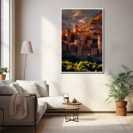 Red-clay fortified Moroccan village below rugged mountains with green palms