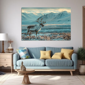 Lone reindeer on a frozen Arctic plain beneath teal snow-dusted mountains