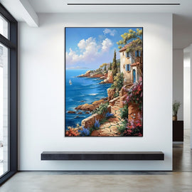 Mediterranean cliffside villa with flowers and a sailboat over the sea