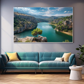 River gorge with emerald water and a lone pine on a cliff
