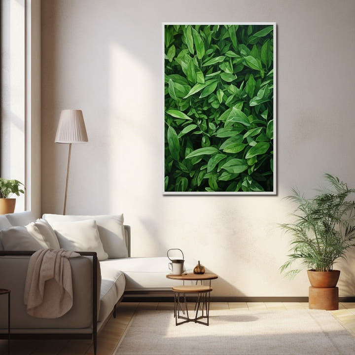 Close-up of dense glossy elongated green leaves filling the frame
