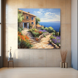 Mediterranean stone cottage above the sea with poppies, lavender and flagstone steps