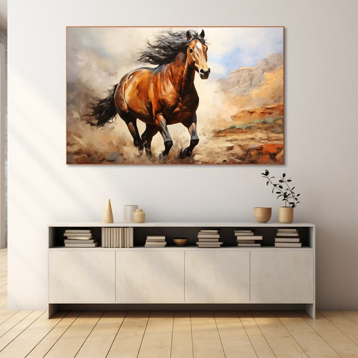 Bay horse with black mane galloping through an ochre desert canyon