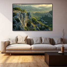 Limestone cliffs over a golden valley with a winding river at dusk