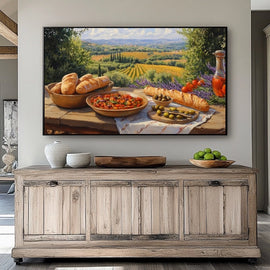 Tuscan landscape with vineyards, lavender and a rustic table of bread and olives