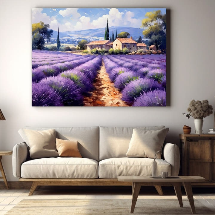 Lavender rows leading to a stone farmhouse with cypress trees in Provence