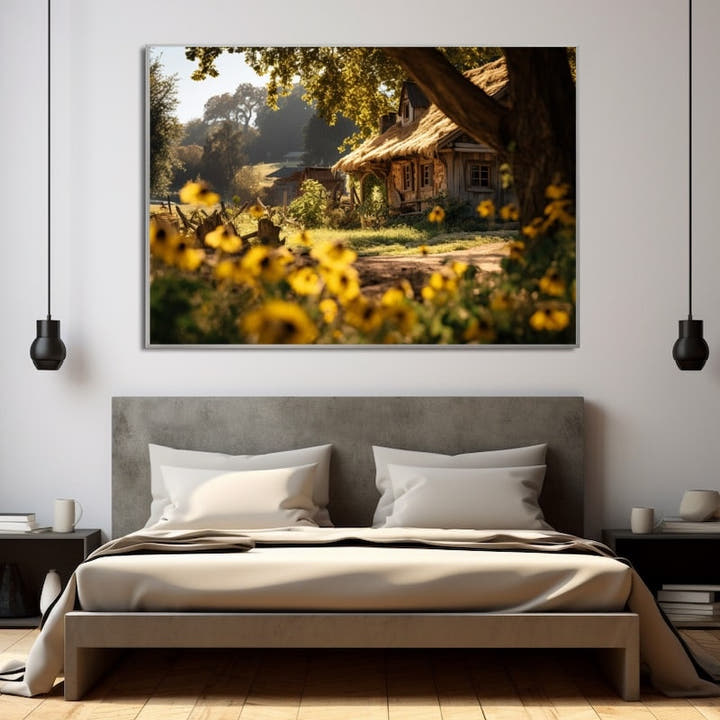 Rustic thatched cottage seen through golden wildflowers in hazy morning light