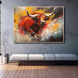 Abstract red bull charging amid bursts of yellow and crimson paint
