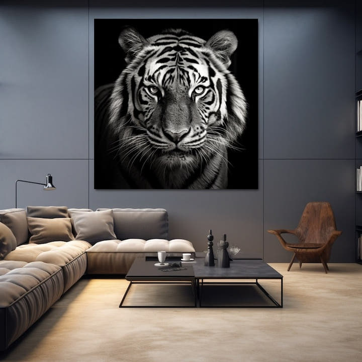 Close-up black and white tiger face portrait on black background