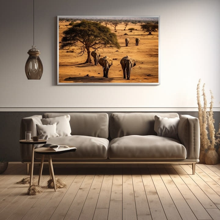 Herd of elephants under an acacia on the savannah