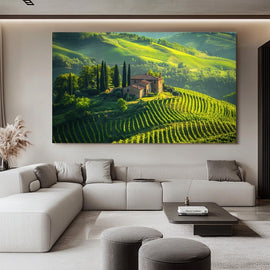Tuscan vineyards rolling across green hills with a stone farmhouse and cypress trees in warm light